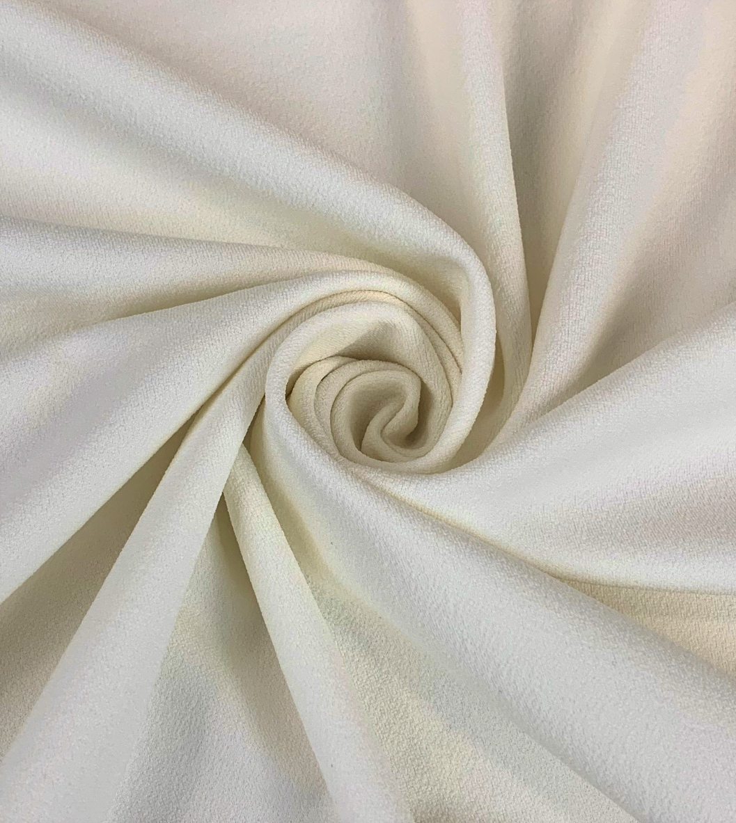 https://www.croftmill.fr/images/pictures/2-2021/01-january-2021/jk-scuba-crepe-ivory-polyester-scuba-knitted-stretch-crepe-fabric-close-up-fabric-photo.jpg?v=c67c8923